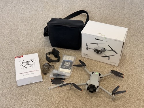 Dji mini pro and battery - and,